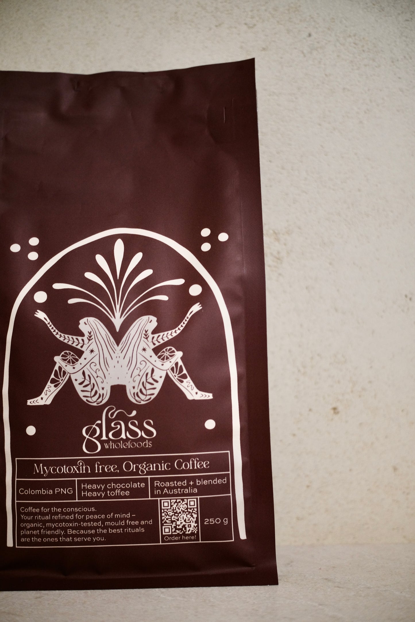 Glass Wholefoods Mycotoxin Free Organic Coffee 250g package with botanical design