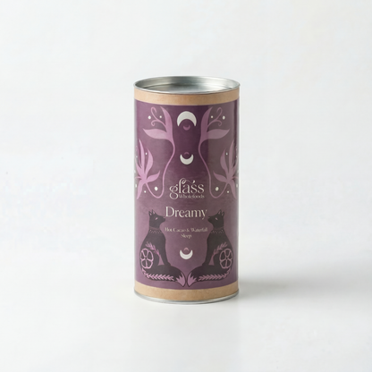 Glass Wholefoods Dreamy Blend canister with purple celestial moon and botanical design on white background