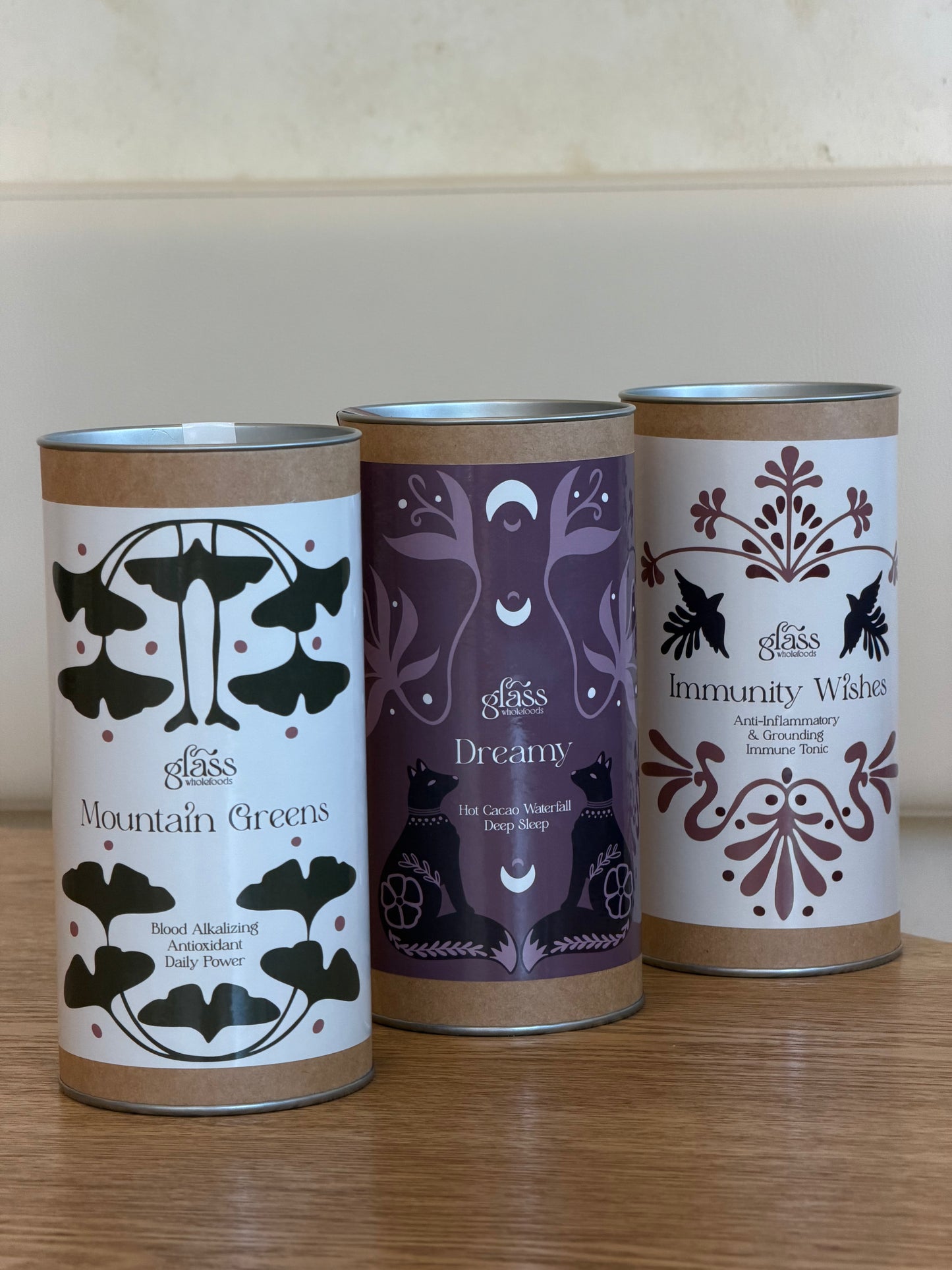 Glass Wholefoods Superfood Bundle featuring three blend canisters - Mountain Greens, Dreamy, and Immunity Wishes