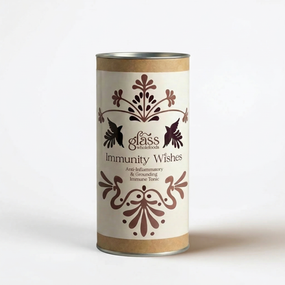 Glass Wholefoods Immunity Wishes Blend canister with botanical bird and floral design on white background