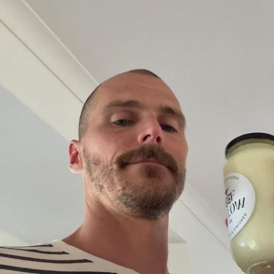 Video testimonial featuring Glass Wholefoods founder discussing grass-fed beef tallow with jar visible