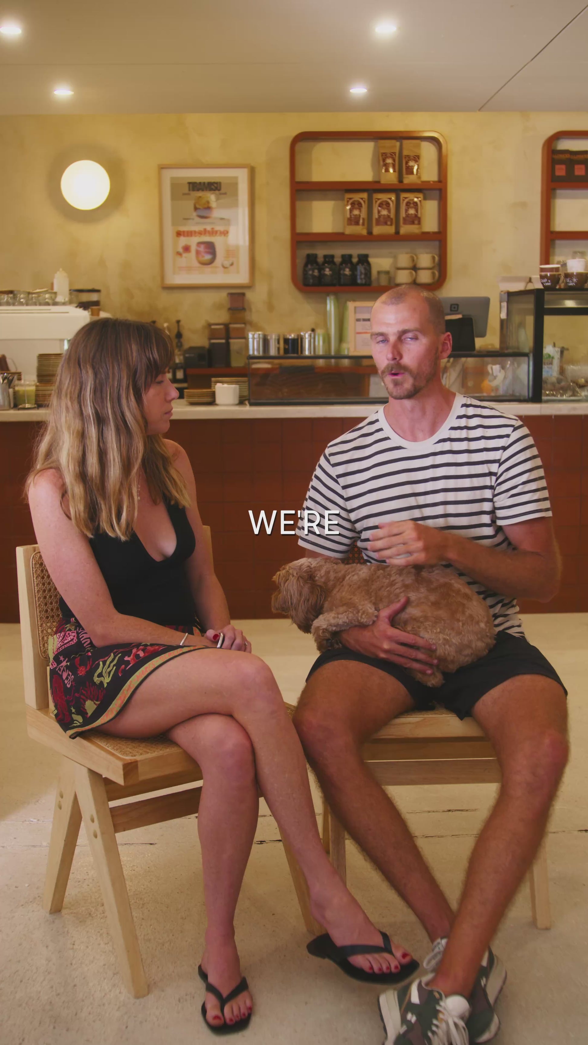 Glass Wholefoods founders discussing mycotoxin-free organic coffee in a café